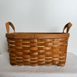Handwoven wooden basket with dual handles